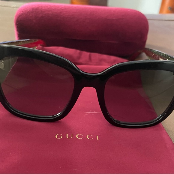 Gucci Accessories - Gucci authentic Black Women's Sunglasses with Gold interlocking G accents.
